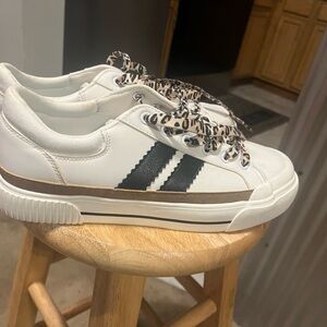 Corkys White and Black Sneakers with Leopard Print Laces. They run narrow.